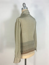 Load image into Gallery viewer, 1970’s silk blouse with Egyptian or Byzantine theme print by Oleg Cassini