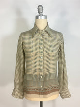 Load image into Gallery viewer, 1970’s silk blouse with Egyptian or Byzantine theme print by Oleg Cassini
