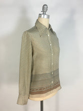 Load image into Gallery viewer, 1970’s silk blouse with Egyptian or Byzantine theme print by Oleg Cassini