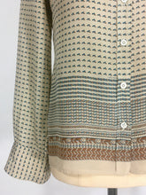 Load image into Gallery viewer, 1970’s silk blouse with Egyptian or Byzantine theme print by Oleg Cassini