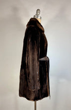 Load image into Gallery viewer, 1970s dark brown sheared fur and leather pieced coat &amp; belt by Ben-Ric
