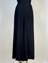 Load image into Gallery viewer, 1990&#39;s sexy black jumpsuit with cage style halter neck &amp; back size Small
