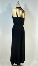 Load image into Gallery viewer, 1990&#39;s sexy black jumpsuit with cage style halter neck &amp; back size Small
