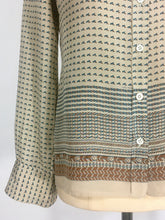 Load image into Gallery viewer, 1970’s silk blouse with Egyptian or Byzantine theme print by Oleg Cassini
