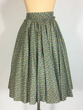 Load image into Gallery viewer, 1950’s one of a kind homemade cotton ditsy print 2-pc halter top and circle skirt set

